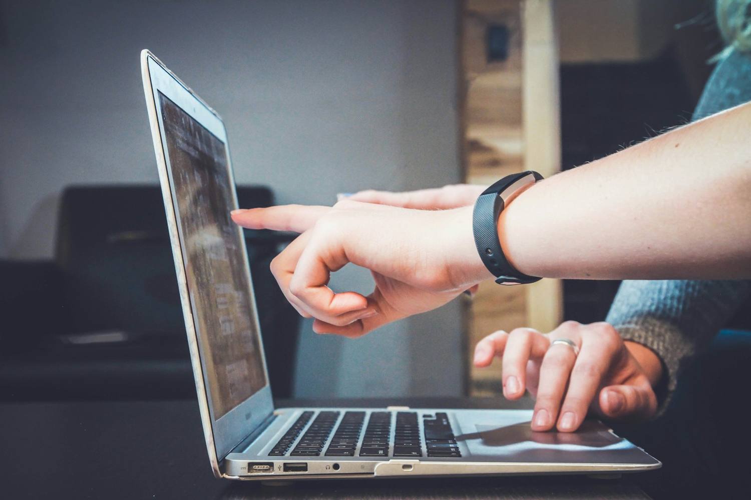 Hands at a keyboard, applications going out